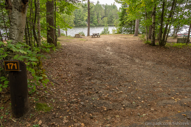 Campsite Photo of Site 200 at Fish Creek Pond Campground, New York - Looking at Site from Road Sign Visible