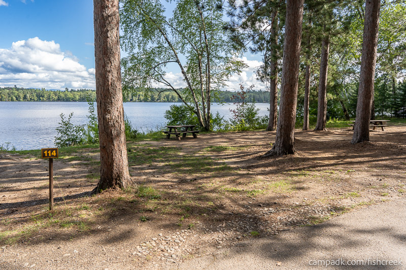 Campsite Photo of Site 146 at Fish Creek Pond Campground, New York - Looking at Site from Road Sign Visible