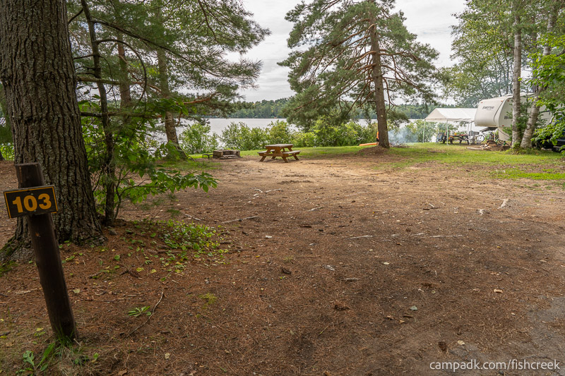 Campsite Photo of Site 135 at Fish Creek Pond Campground, New York - Looking at Site from Road Sign Visible