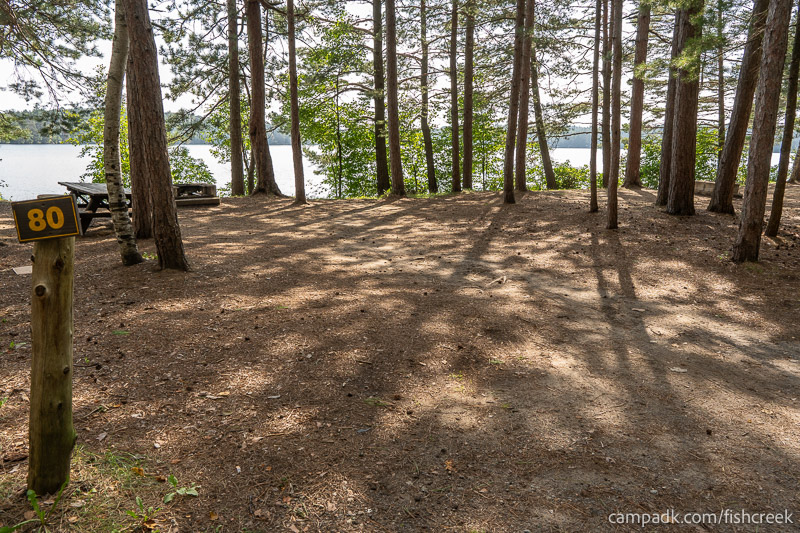 Campsite Photo of Site 112 at Fish Creek Pond Campground, New York - Looking at Site from Road Sign Visible