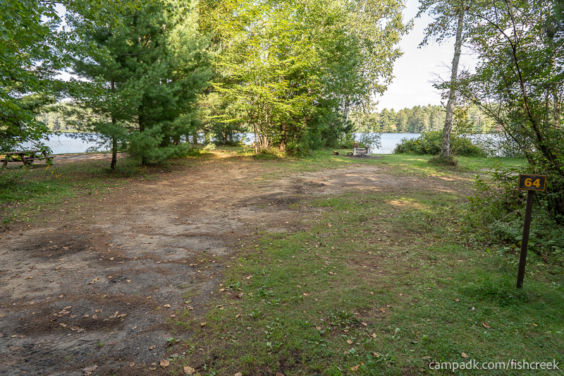 Campsite Photo of Site 83 at Fish Creek Pond Campground, New York - Looking at Site from Road Sign Visible