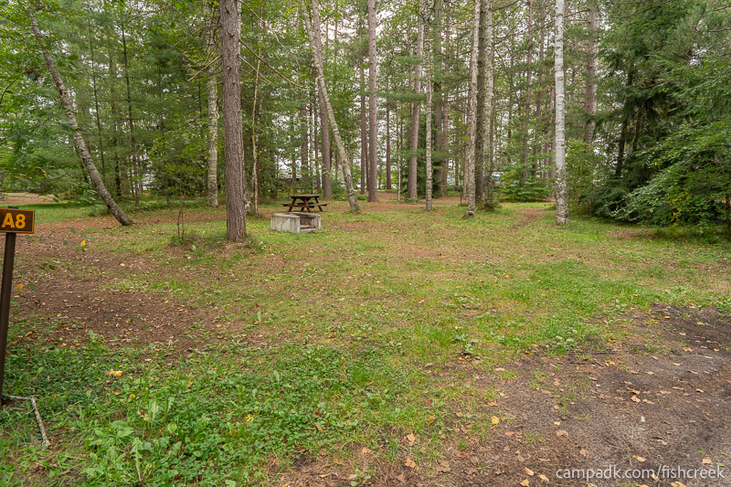 Campsite Photo of Site 78 at Fish Creek Pond Campground, New York - Looking at Site from Road Sign Visible