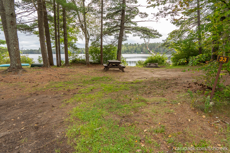 Campsite Photo of Site 34 at Fish Creek Pond Campground, New York - Looking at Site from Road Sign Visible