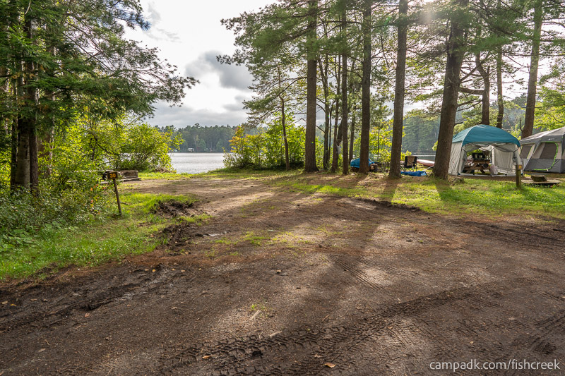 Campsite Photo of Site 31 at Fish Creek Pond Campground, New York - Looking at Site from Road Sign Visible
