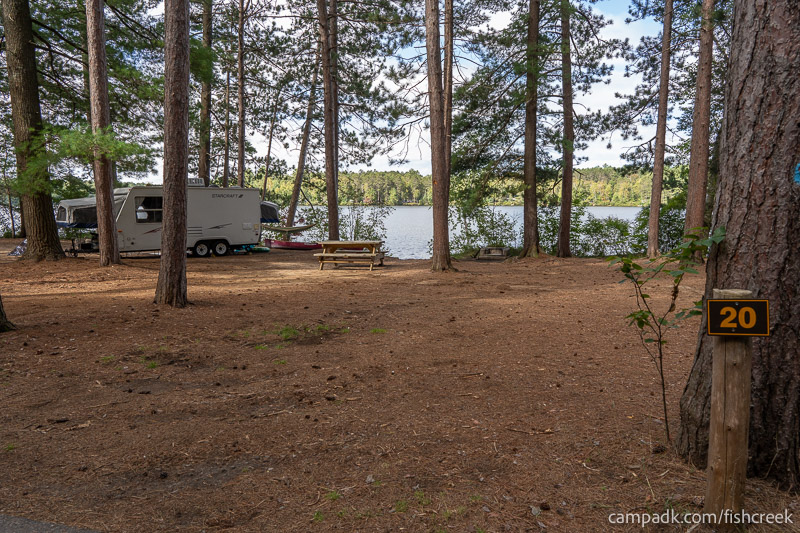Campsite Photo of Site 17 at Fish Creek Pond Campground, New York - Looking at Site from Road Sign Visible