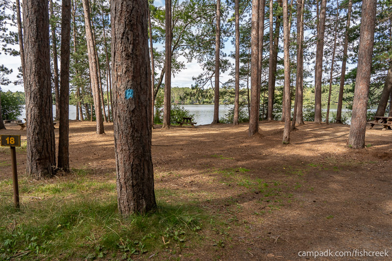 Campsite Photo of Site 15 at Fish Creek Pond Campground, New York - Looking at Site from Road Sign Visible