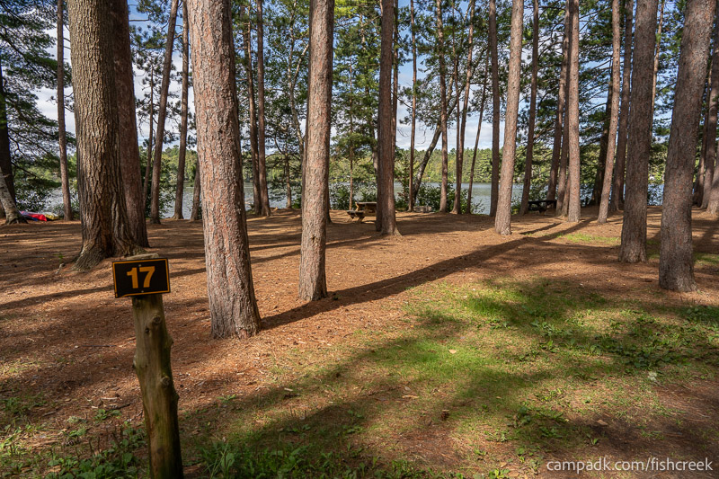 Campsite Photo of Site 14 at Fish Creek Pond Campground, New York - Looking at Site from Road Sign Visible
