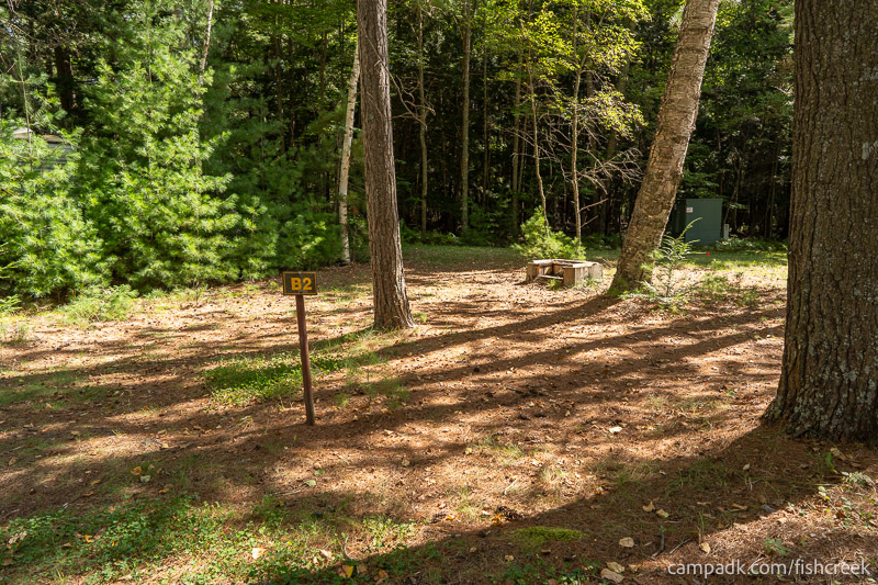Campsite Photo of Site 2 at Fish Creek Pond Campground, New York - Looking at Site from Road Sign Visible