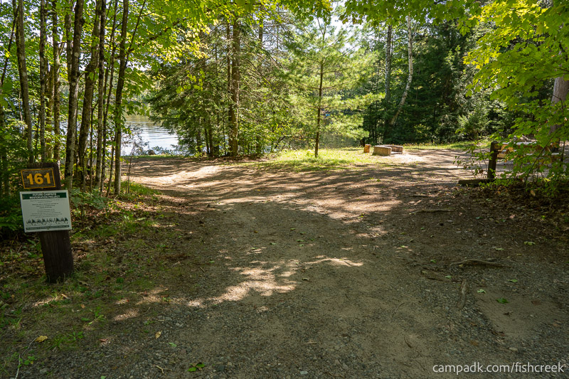 Campsite Photo of Site 191 at Fish Creek Pond Campground, New York - Looking at Site from Road Sign Visible