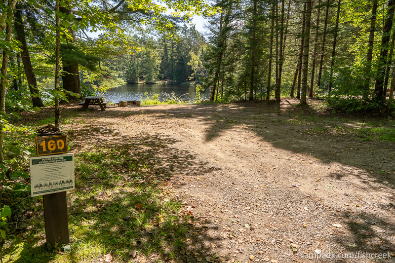 Campsite Photo of Site 190 at Fish Creek Pond Campground, New York - Looking at Site from Road Sign Visible