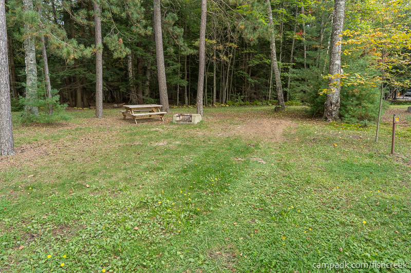 Campsite Photo of Site 3 at Fish Creek Pond Campground, New York - Looking at Site from Road Sign Visible