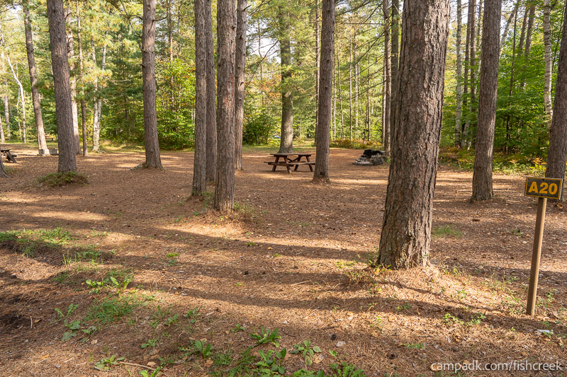Campsite Photo of Site 105 at Fish Creek Pond Campground, New York - Looking at Site from Road Sign Visible