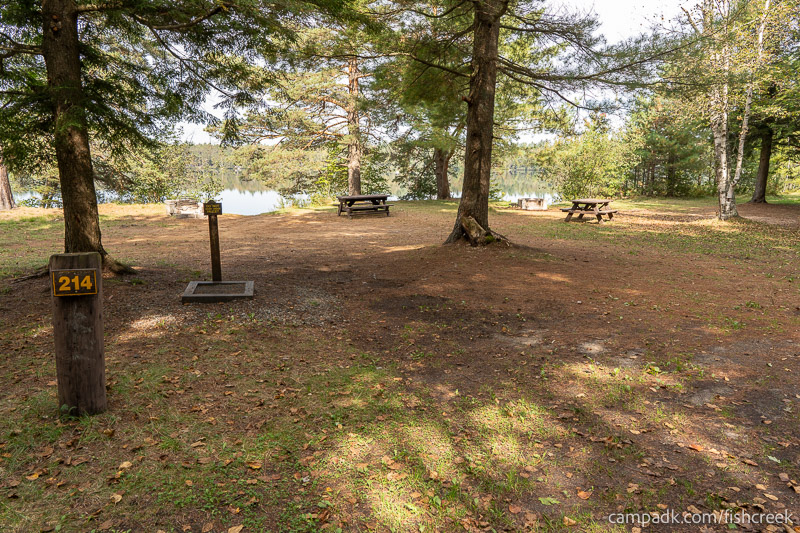 Campsite Photo of Site 242 at Fish Creek Pond Campground, New York - Looking at Site from Road Sign Visible