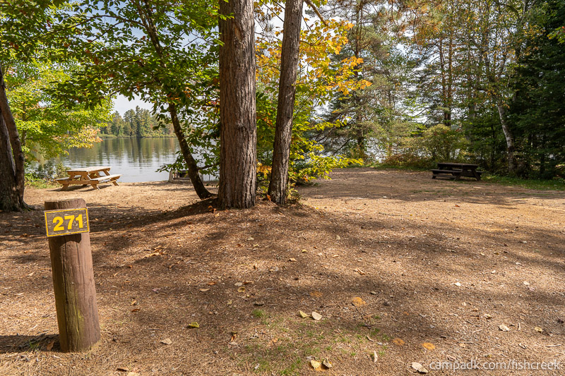 Campsite Photo of Site 299 at Fish Creek Pond Campground, New York - Looking at Site from Road Sign Visible