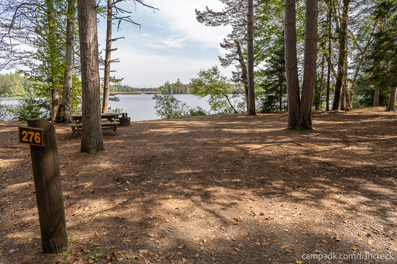Campsite Photo of Site 304 at Fish Creek Pond Campground, New York - Looking at Site from Road Sign Visible