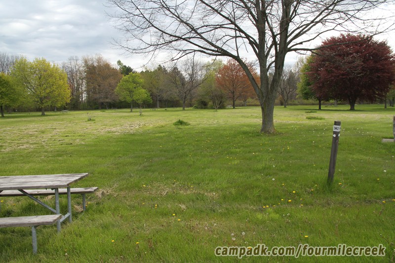 Campsite Photo of Site 362 at Four Mile Creek State Park, New York - Looking at Site from Road Sign Visible