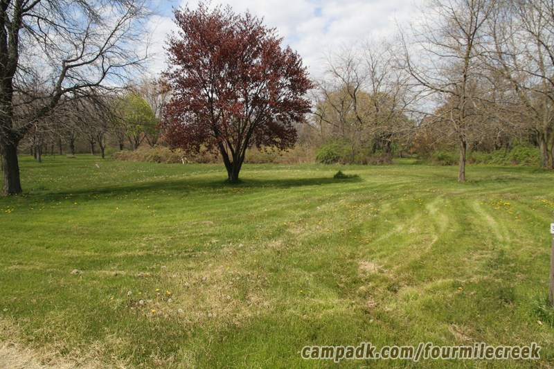 Campsite Photo of Site 372 at Four Mile Creek State Park, New York - Looking at Site from Road Sign Visible
