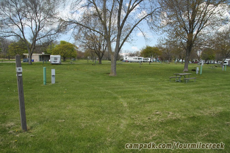 Campsite Photo of Site 16 at Four Mile Creek State Park, New York - Looking at Site from Road Sign Visible
