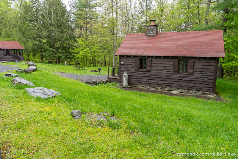 Campsite Photo of Site 23 at Gilbert Lake State Park, New York - Looking at Site from Road Sign Visible