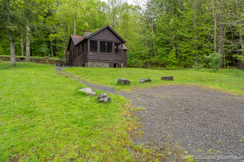 Campsite Photo of Site 26 at Gilbert Lake State Park, New York - Looking at Site from Road Sign Visible