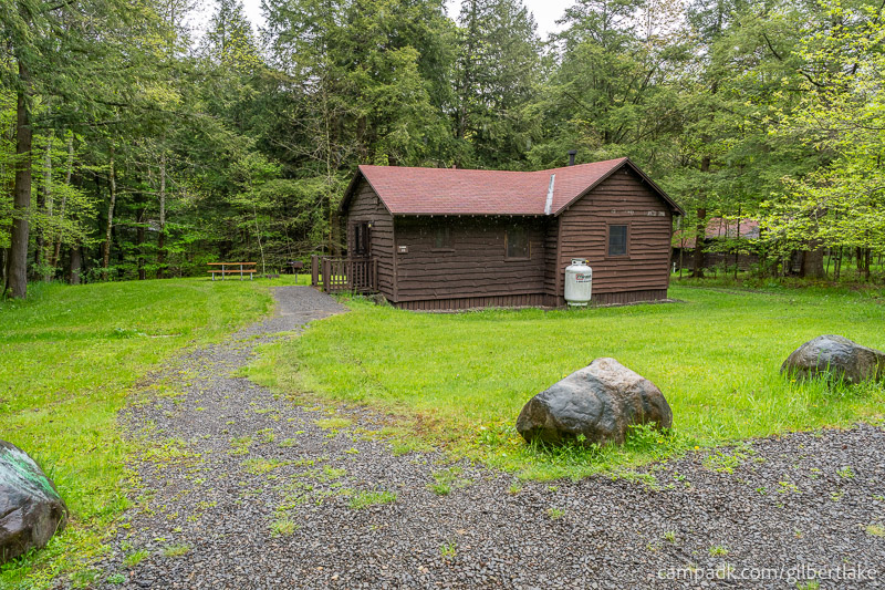 Campsite Photo of Site 10 at Gilbert Lake State Park, New York - Looking at Site from Road Sign Visible