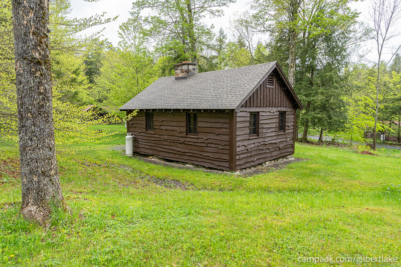 Campsite Photo of Site 13 at Gilbert Lake State Park, New York - Looking at Site from Road Sign Visible