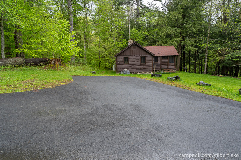 Campsite Photo of Site 16 at Gilbert Lake State Park, New York - Looking at Site from Road Sign Visible