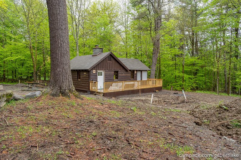 Campsite Photo of Site 29 at Gilbert Lake State Park, New York - Looking at Site from Road Sign Visible