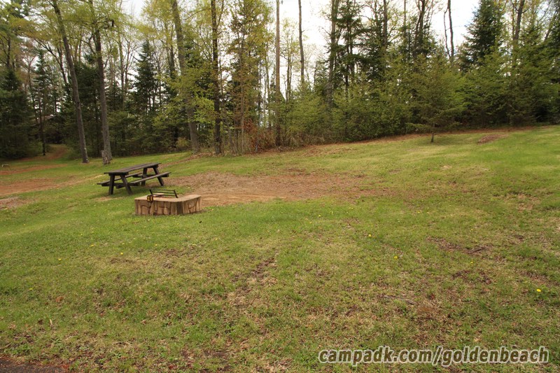 Campsite Photo of Site 21 at Golden Beach Campground, New York - Looking at Site from Road Sign Visible