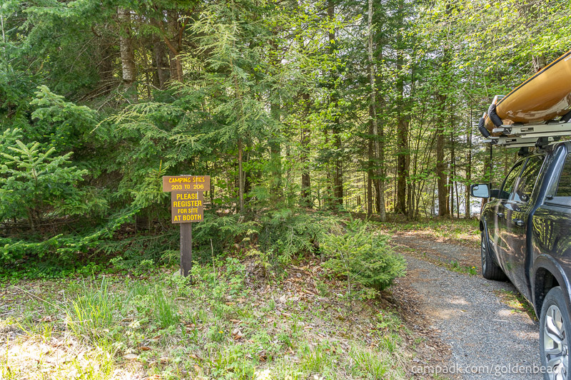 Campsite Photo of Site 205 at Golden Beach Campground, New York - Looking at Site from Road Sign Visible