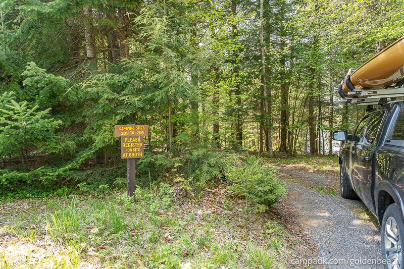 Campsite Photo of Site 206 at Golden Beach Campground, New York - Looking at Site from Road Sign Visible