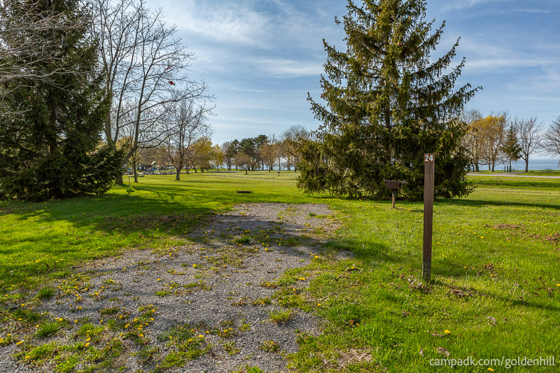 Campsite Photo of Site 24 at Golden Hill State Park, New York - Looking at Site from Road Sign Visible