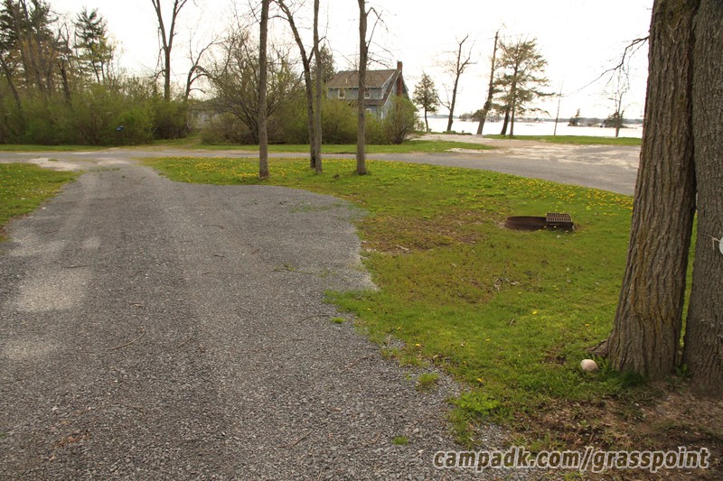 Campsite Photo of Site 71 at Grass Point State Park, New York - Looking at Site from Road Sign Visible