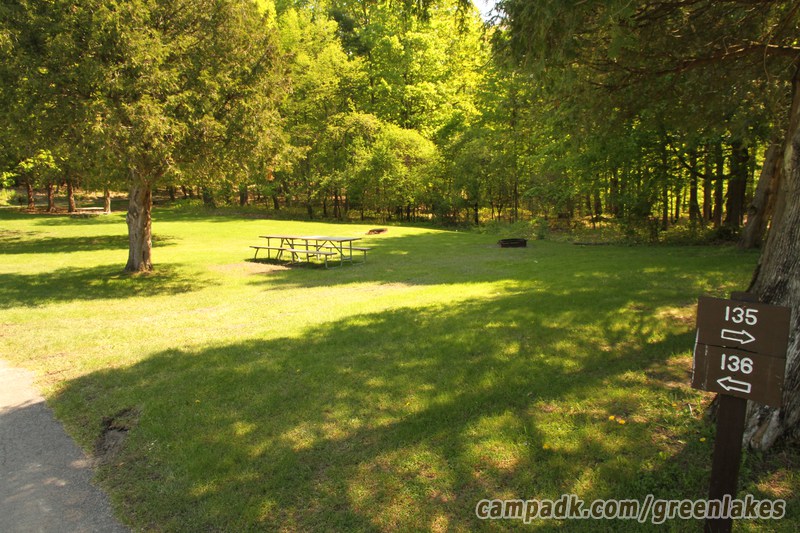 Campsite Photo of Site 136 at Green Lakes State Park, New York - Looking at Site from Road Sign Visible