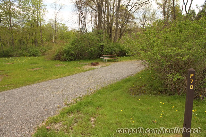 Campsite Photo of Site 70 at Hamlin Beach State Park, New York - Looking at Site from Road Sign Visible
