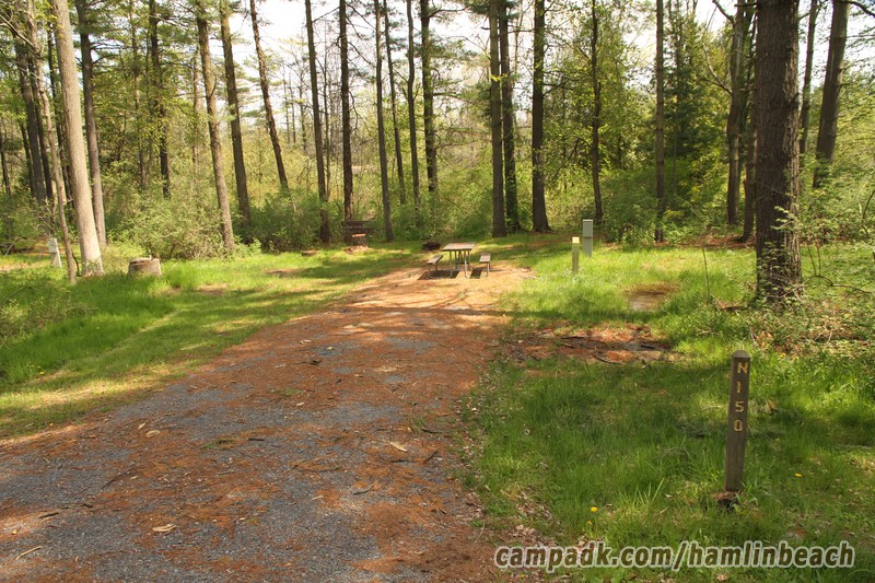 Campsite Photo of Site 150 at Hamlin Beach State Park, New York - Looking at Site from Road Sign Visible