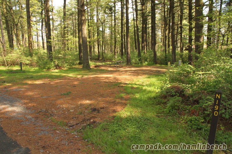 Campsite Photo of Site 190 at Hamlin Beach State Park, New York - Looking at Site from Road Sign Visible