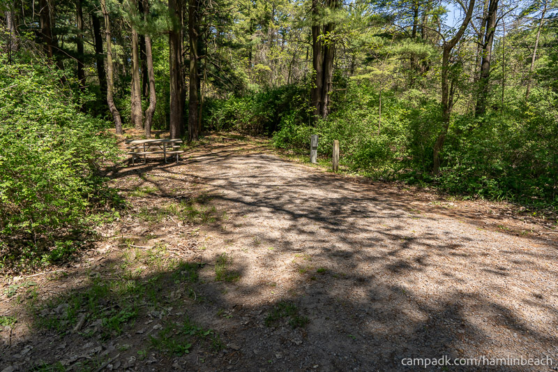 Campsite Photo of Site 175 at Hamlin Beach State Park, New York - Looking at Site from Road Sign Visible