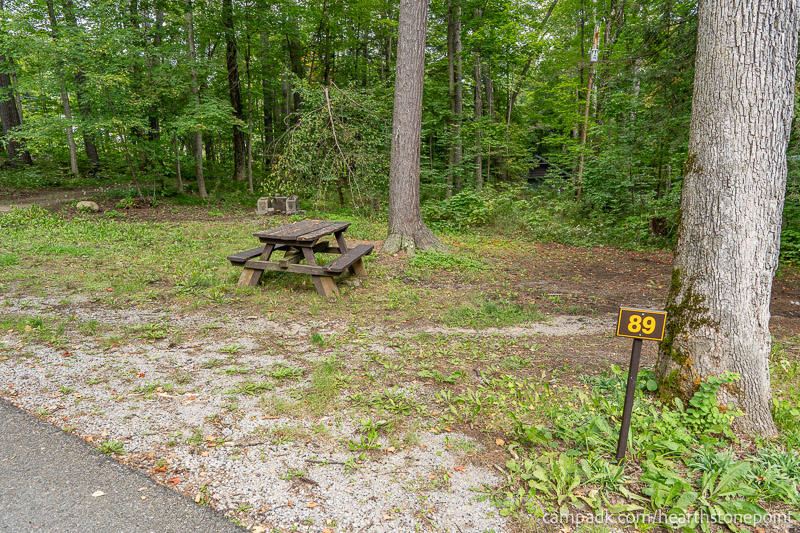 Campsite Photo of Site 89 at Hearthstone Point Campground, New York - Looking at Site from Road Sign Visible