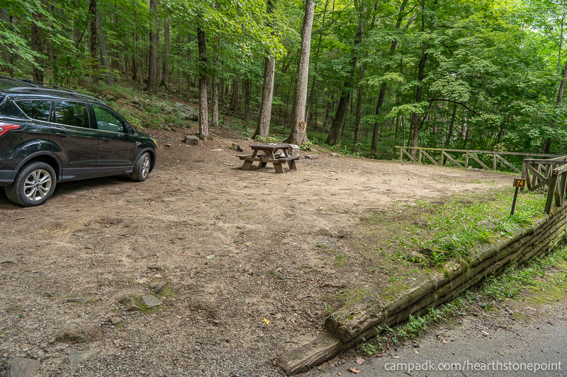 Campsite Photo of Site 74 at Hearthstone Point Campground, New York - Looking at Site from Road Sign Visible