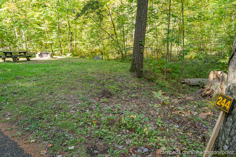 Campsite Photo of Site 244 at Hearthstone Point Campground, New York - Looking at Site from Road Sign Visible