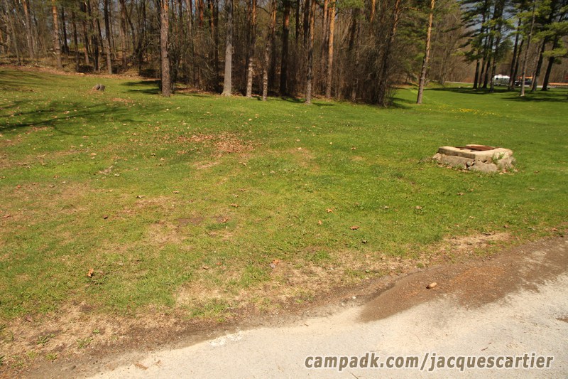 Campsite Photo of Site 30 at Jacques Cartier State Park, New York - Looking at Site from Road Sign Visible