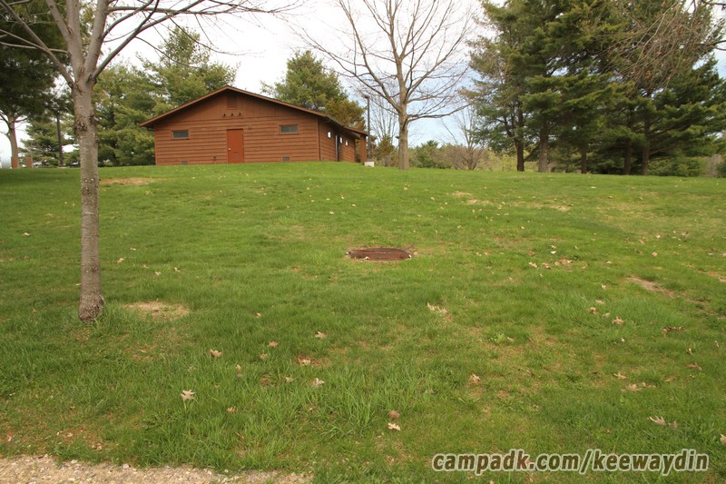Campsite Photo of Site 20 at Keewaydin State Park, New York - Looking at Site from Road Sign Visible