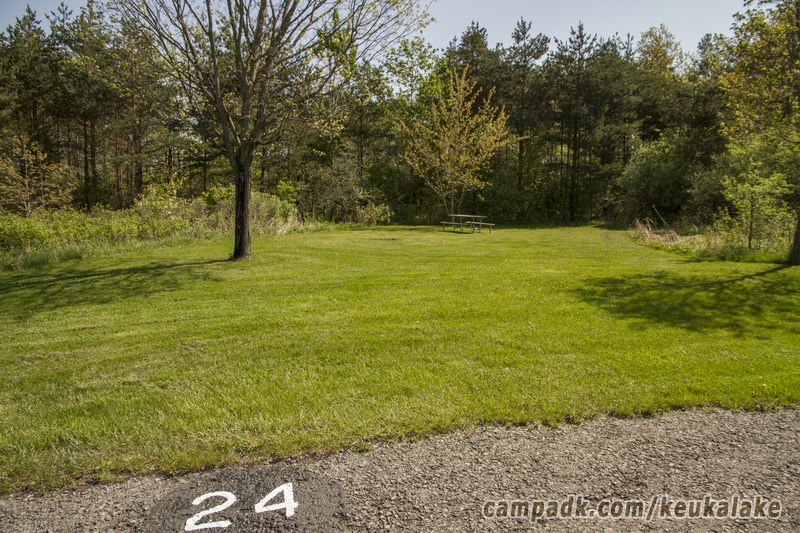 Campsite Photo of Site 65 at Keuka Lake State Park, New York - Looking at Site from Road Sign Visible