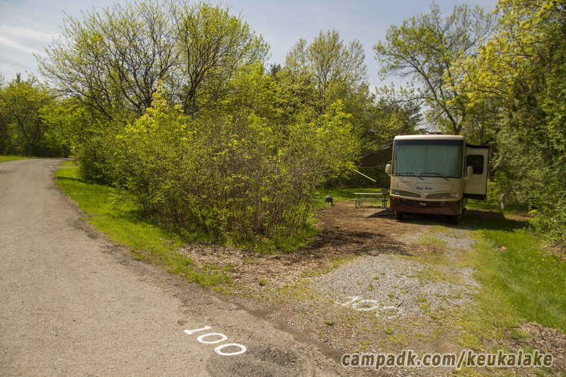 Campsite Photo of Site 50 at Keuka Lake State Park, New York - Looking at Site from Road Sign Visible