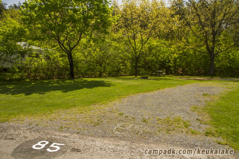 Campsite Photo of Site 20 at Keuka Lake State Park, New York - Looking at Site from Road Sign Visible