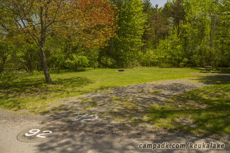 Campsite Photo of Site 25 at Keuka Lake State Park, New York - Looking at Site from Road Sign Visible