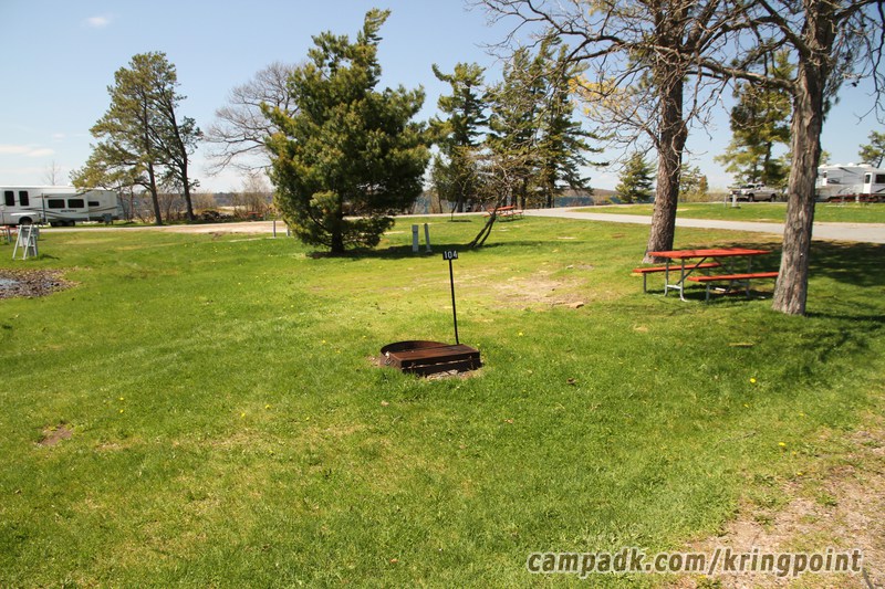 Campsite Photo of Site 104 at Kring Point State Park, New York - Looking at Site from Road Sign Visible
