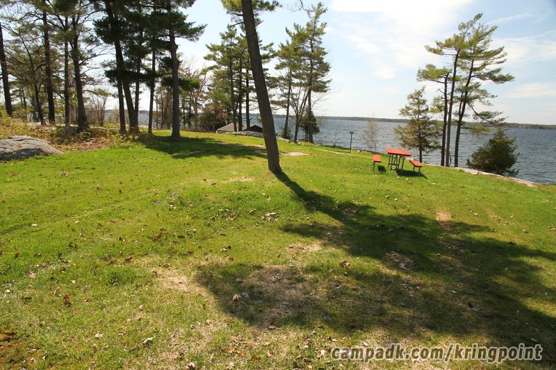 Campsite Photo of Site 63 at Kring Point State Park, New York - Looking at Site from Road Sign Visible