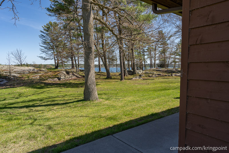 Campsite Photo of Site 14 at Kring Point State Park, New York - Looking at Site from Road Sign Visible